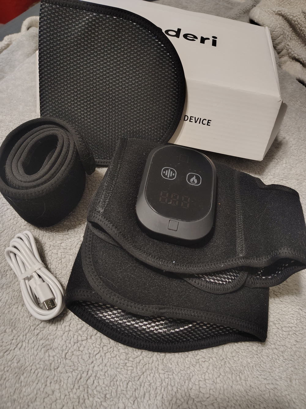 Black Electronic Wearable Therapy Device Belt